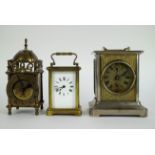 Lot 2 travel alarm clocks and lantern clock