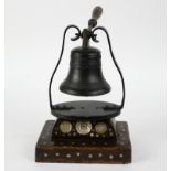 Bronze bell on a wooden base with nacré inlay