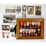 A collection of various medals and photos