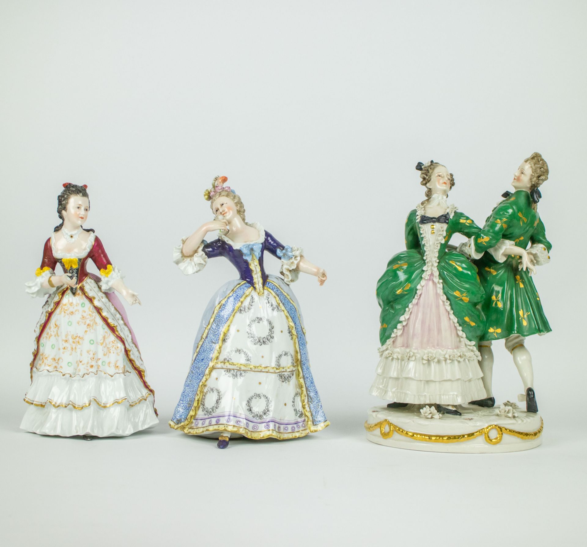 A collection of 3 porcelain figures