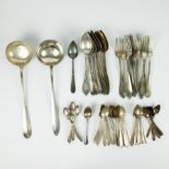 A collection of silver cutlery