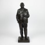 A bronze sculpture of a man