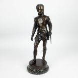 A bronze sculpture of a young Henri V