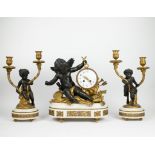 A Louis XVI style clock and candelabra in marble and bronze