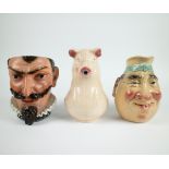 A collection of 3 decorative jugs in earthenware