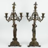 Couple of candlesticks with pillars as a caryatid