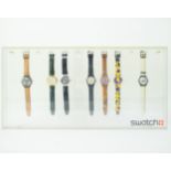 Original Swatch plexibox with 7 Swatch watches