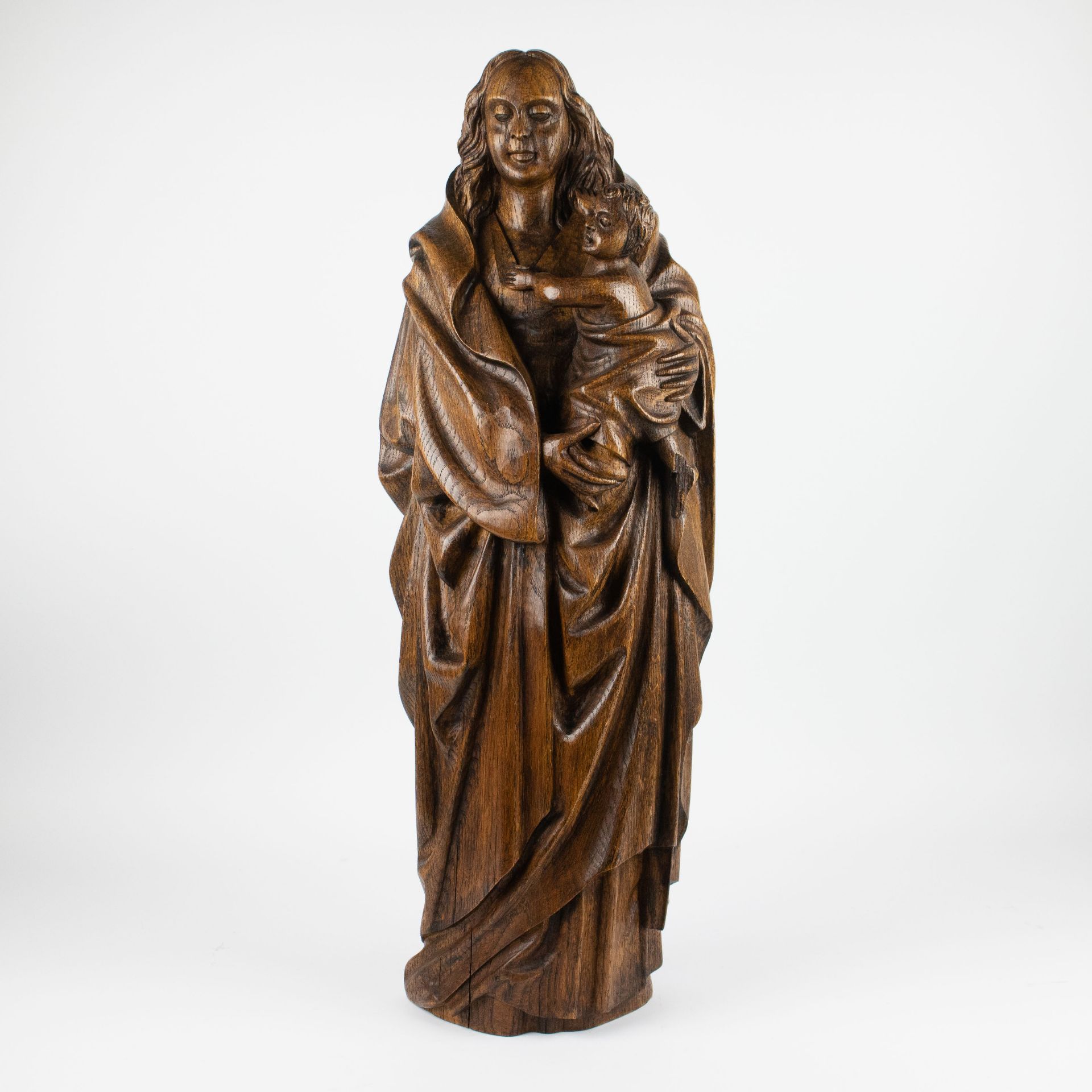 Wooden carved Madonna with child