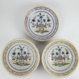 3 polychrome Brussels plates with floral design, 18th/19th C.