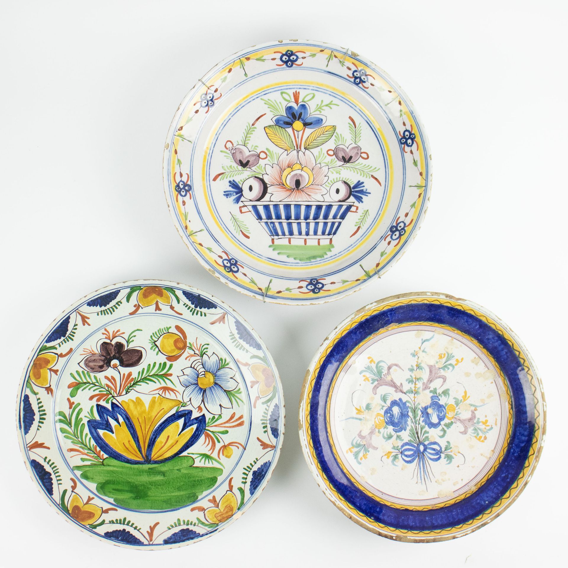 3 plates in Delft and Brussels earthenware