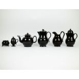 2 black earthenware coffee pots, teapot, milk jug, mustard pot and sugar bowl with silver mounts, Na