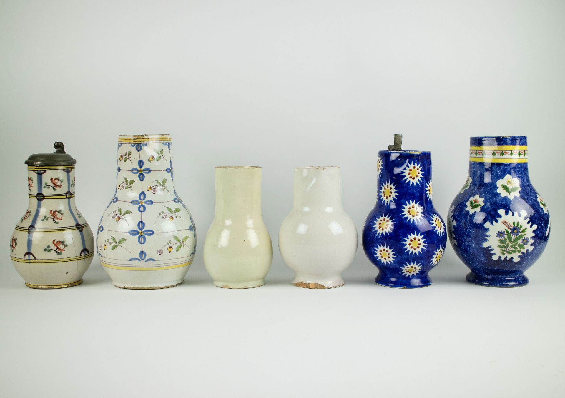 A collection of 6 jugs a.o. Brussels