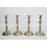 A set of 4 silver 800 candle sticks Belgium