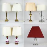 A large collection of table lamps