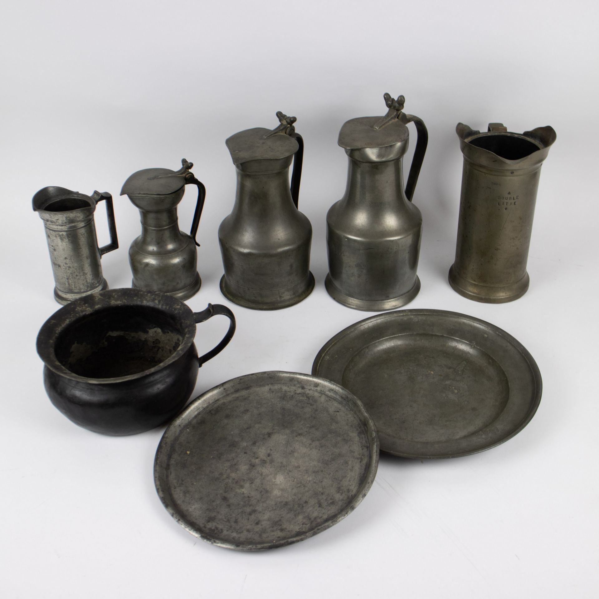 A collection of old tin including 3 18th century French jugs