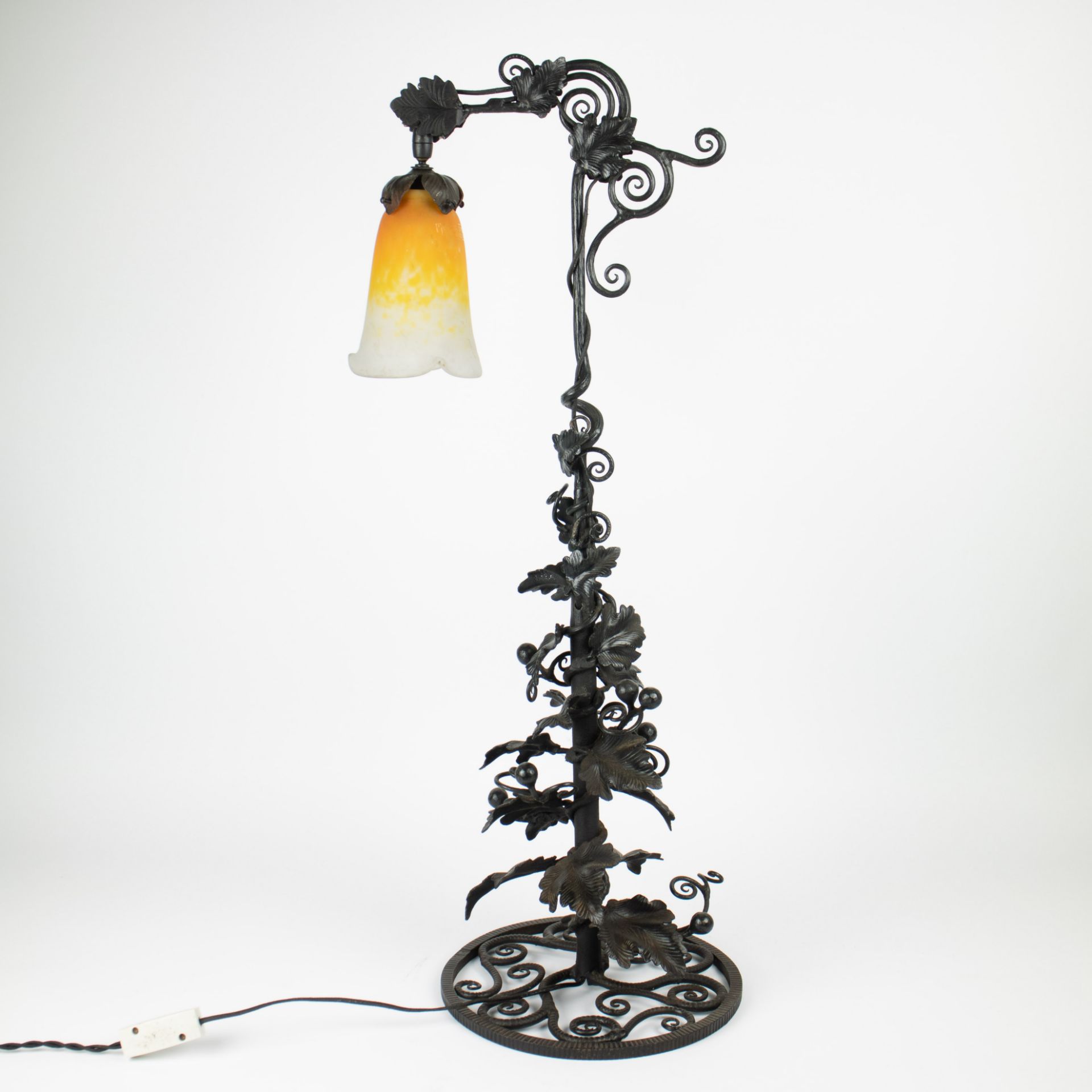 Art Deco cast iron lamp with Muller glass shade