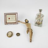 A collection of religious items consisting of a relic, a relic beguine Theressia Verhaeghe, a bottle