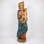 Old polychrome wooden statue Madonna with child