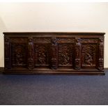 Large oak case with 4 very finely sculpted front panels 17th century