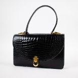 Delvaux croco handbag black