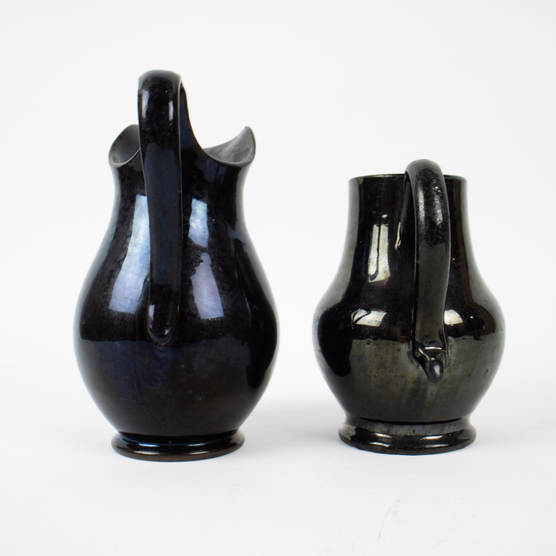 A collection of black glazed jugs, butter pot and salt cellar in Namur earthenware, 18th century - Image 6 of 11