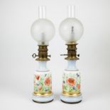 A pair of Napoleon III handpainted oil lamps