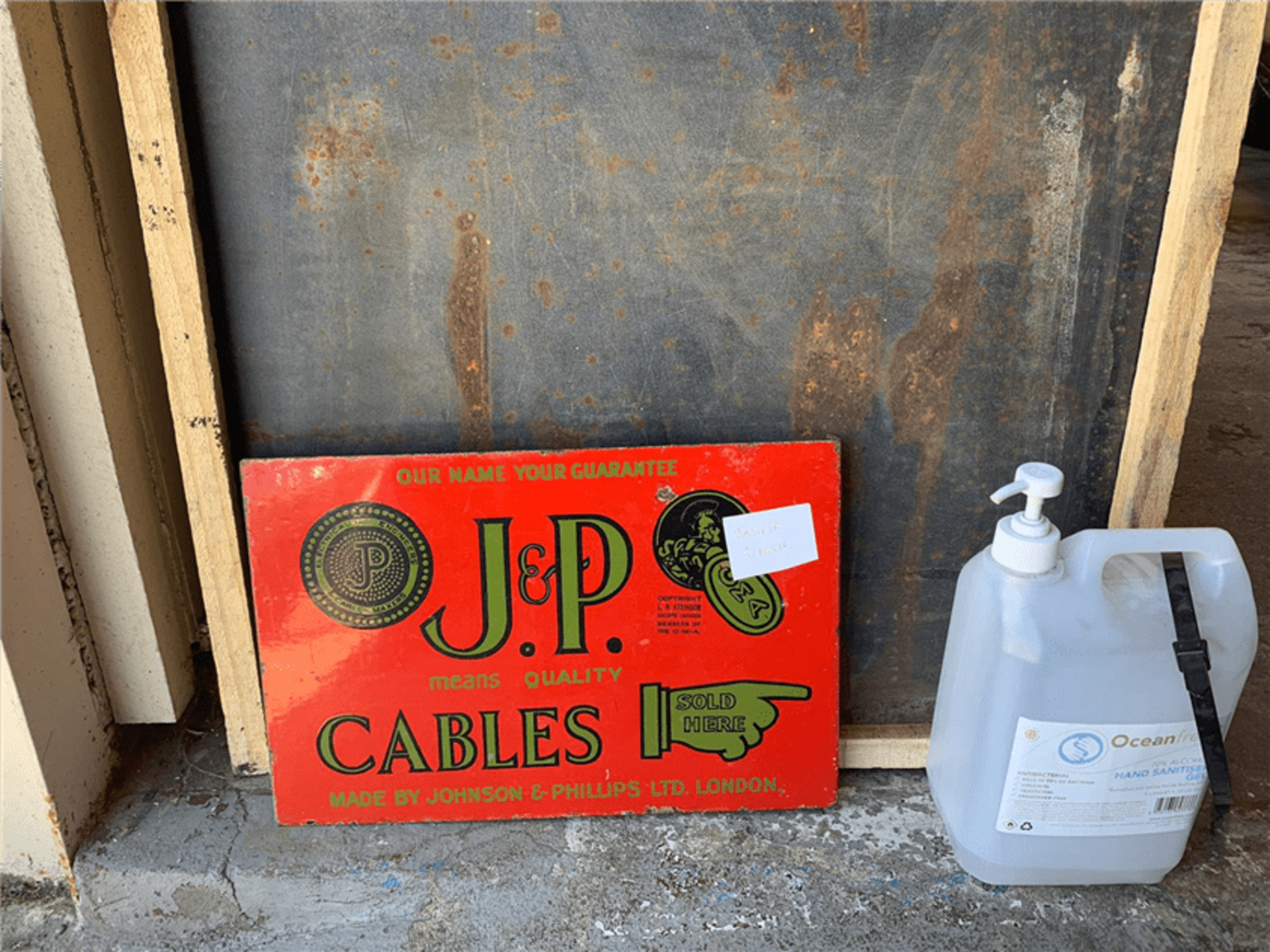 DOUBLE SIDED FLANGED JOHNSON AND PHILLIPS CABLES SIGN