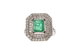 AN EMERALD AND DIAMOND RING