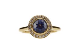 A SAPPHIRE AND DIAMOND RING