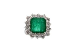 AN EMERALD AND DIAMOND RING