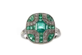 AN EMERALD AND DIAMOND RING