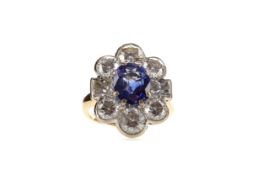 A SAPPHIRE AND DIAMOND RING