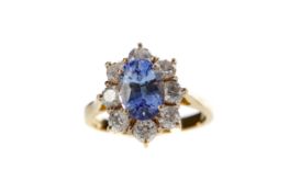 A SAPPHIRE AND DIAMOND RING