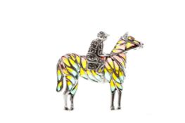 A PLIQUE A JOUR HORSE AND JOCKEY BROOCH