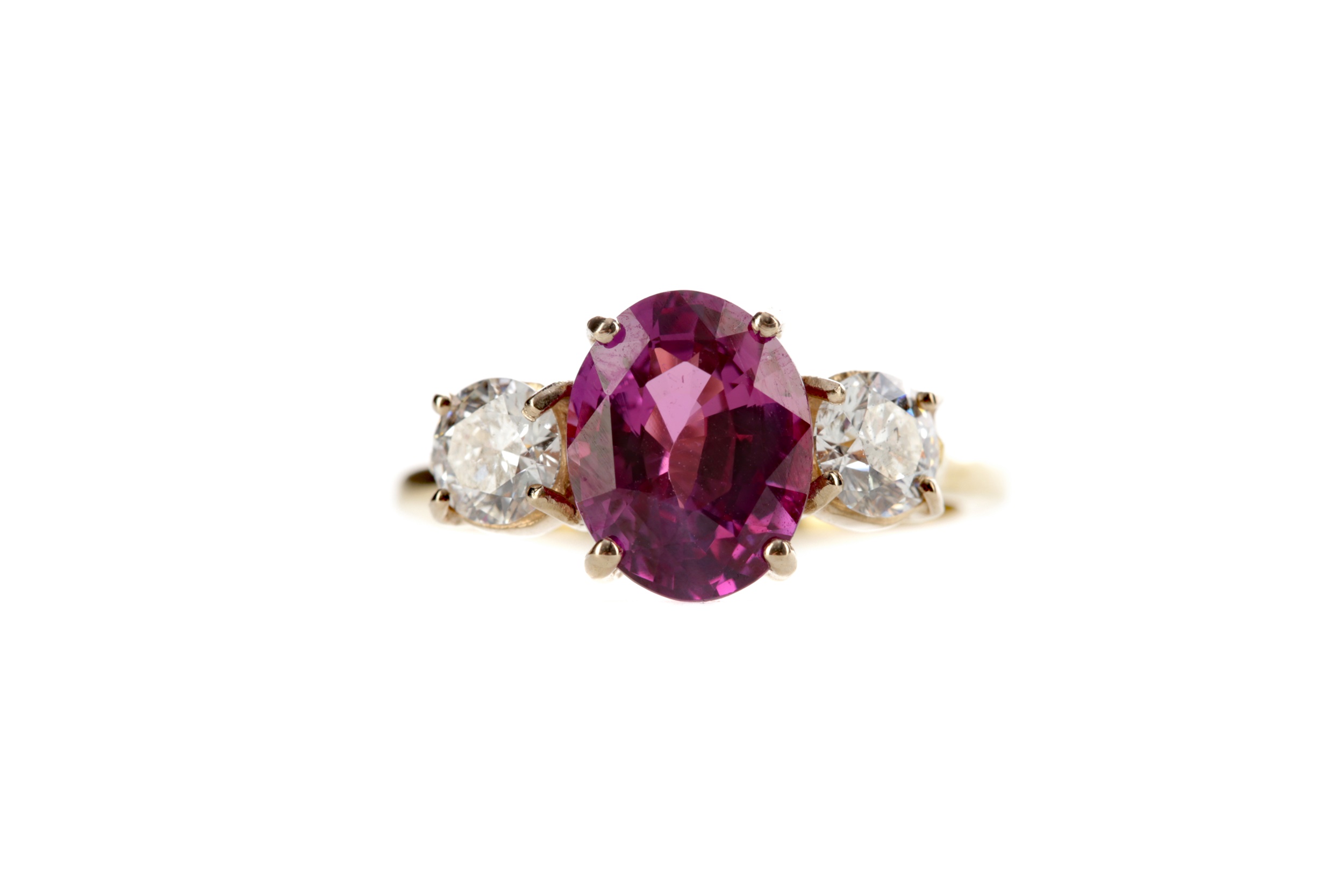 A PINK SAPPHIRE AND DIAMOND RING