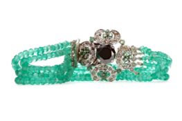 AN EMERALD AND BLACK DIAMOND BRACELET