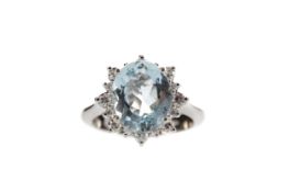 AN AQUAMARINE AND DIAMOND RING