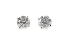 A PAIR OF CERTIFICATED DIAMOND STUD EARRINGS