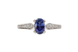 A SAPPHIRE AND DIAMOND RING