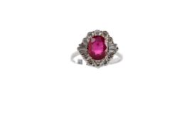 A GLASS FILLED RUBY AND DIAMOND RING
