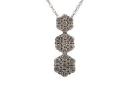 A DIAMOND CLUSTER PENDANT