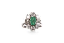 AN EMERALD AND DIAMOND RING