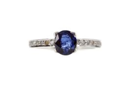 A SAPPHIRE AND DIAMOND RING