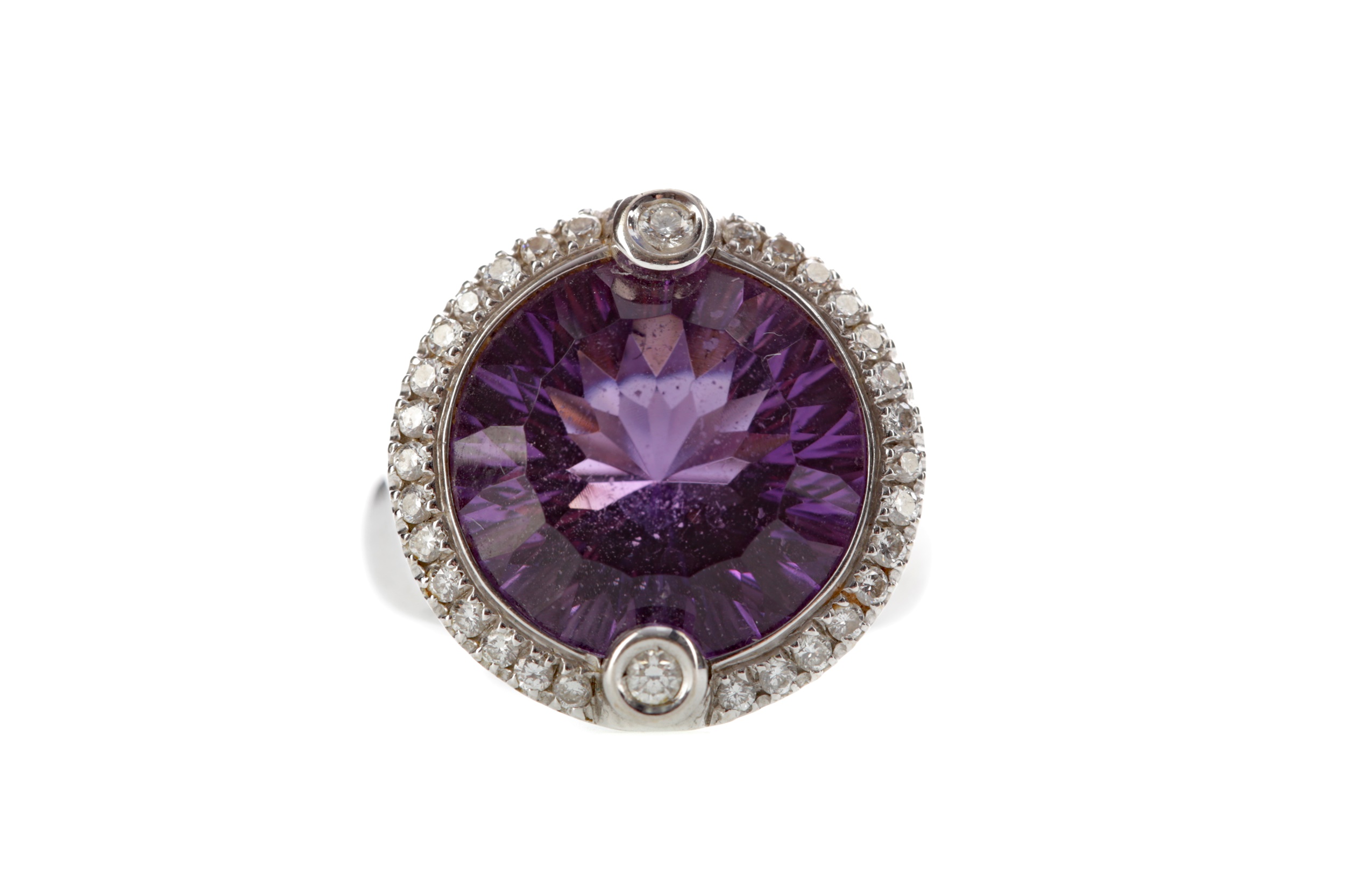 AN AMETHYST AND DIAMOND RING