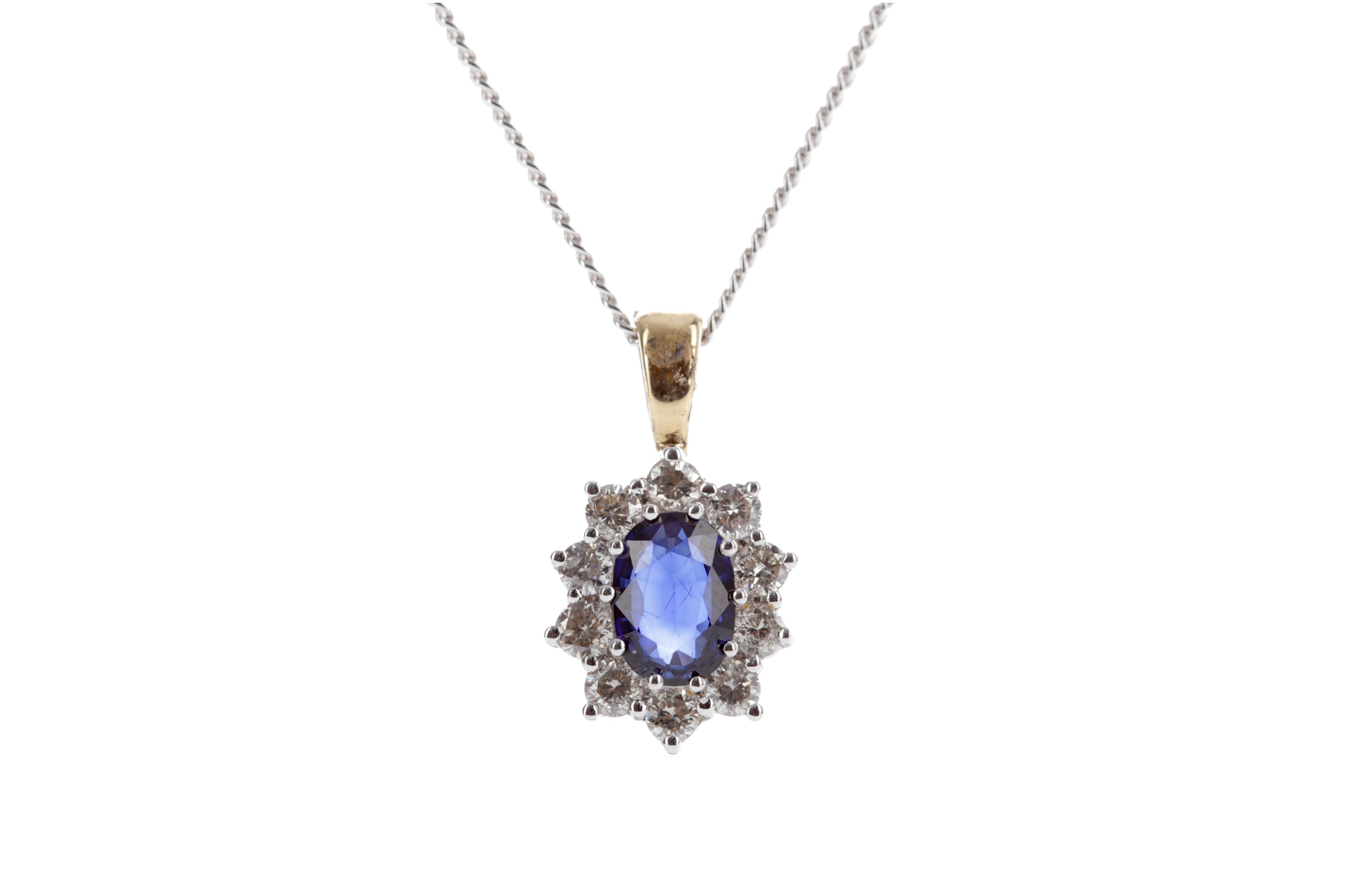 A SAPPHIRE AND DIAMOND PENDANT