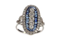 A SAPPHIRE AND DIAMOND RING