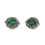 A PAIR OF EMERALD AND DIAMOND EARRINGS