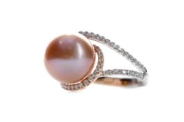 A PINK PEARL AND DIAMOND RING
