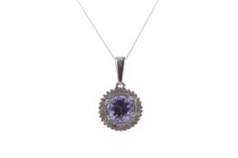 A TANZANITE AND DIAMOND PENDANT