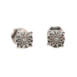 A PAIR OF DIAMOND STUD EARRINGS